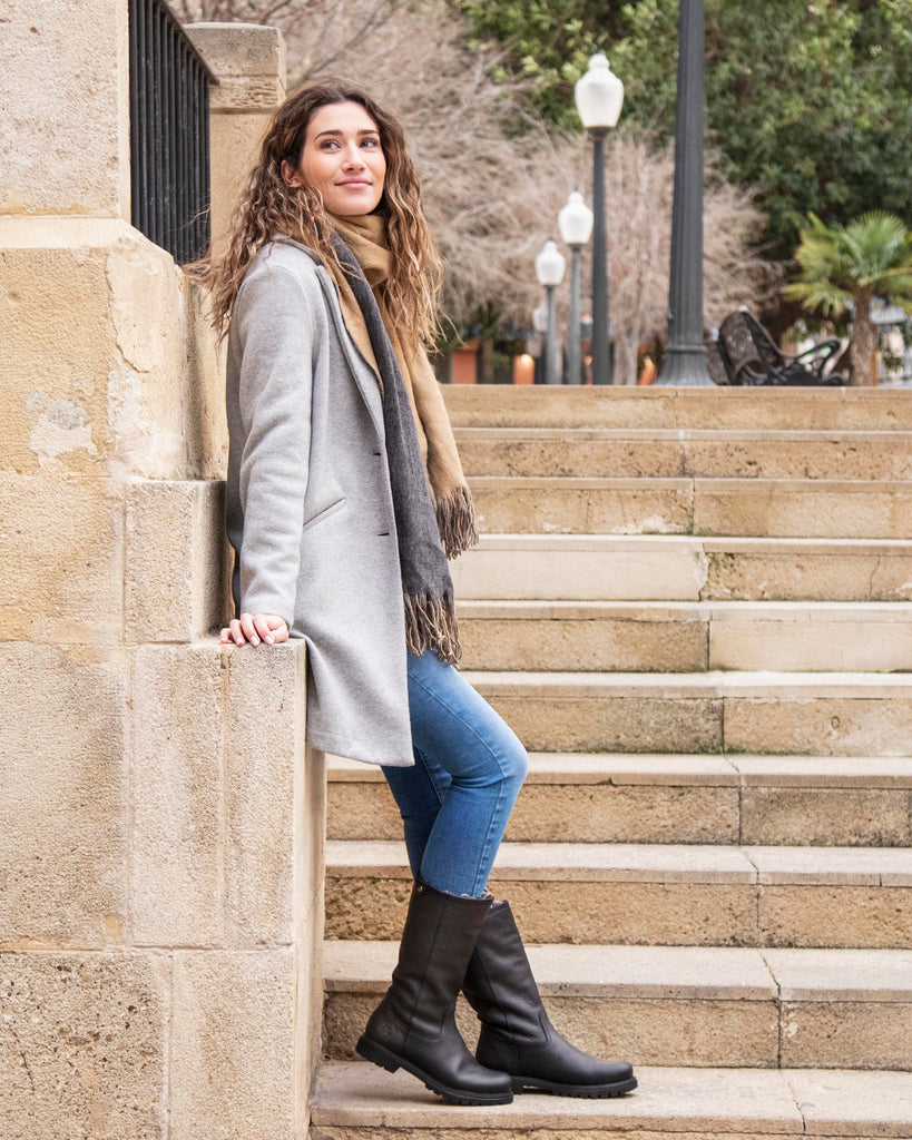 Bambina botas de piel con forro interior de pelo. negro