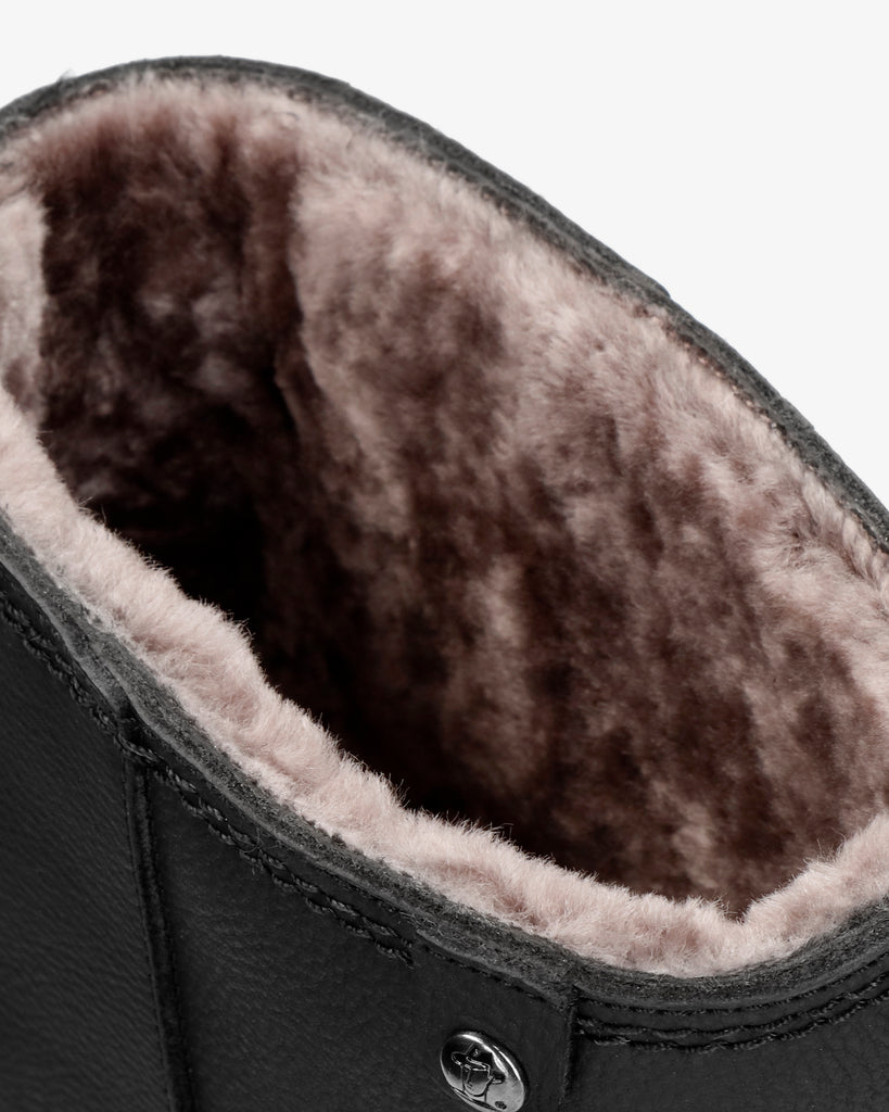 Bambina Igloo botas de piel con forro interior de pelo natural. negro