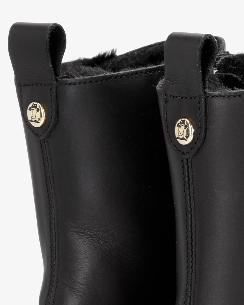 Fara Trav botas de piel con forro interior de pelo. negro