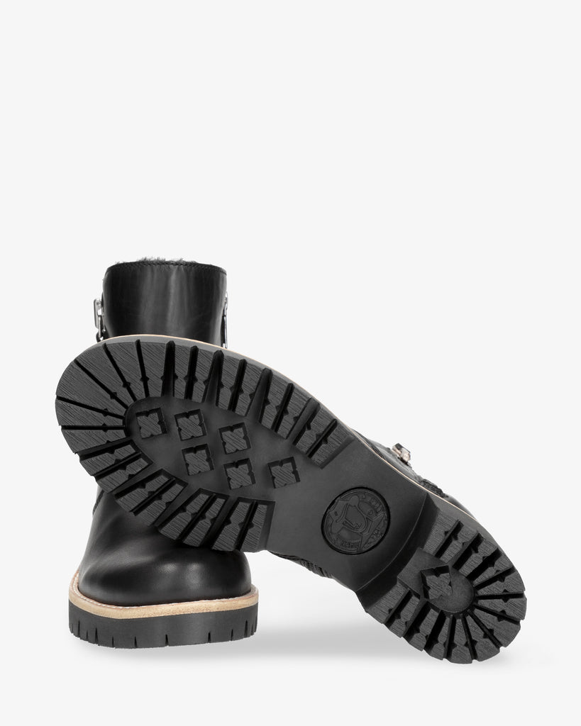 Pauline Trav botines de piel con forro interior de pelo. negro